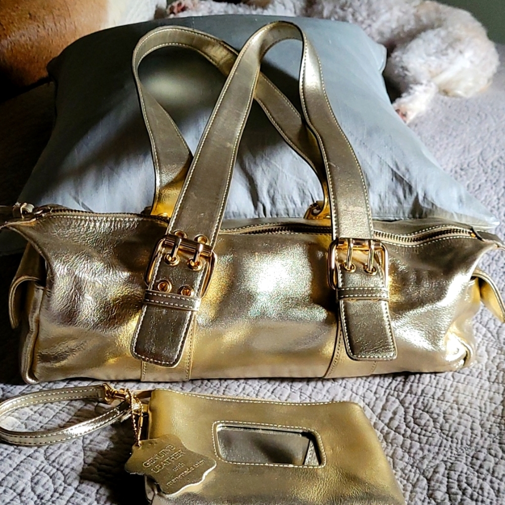 Valery Stevens Gold, leather barrel bag with pouch.